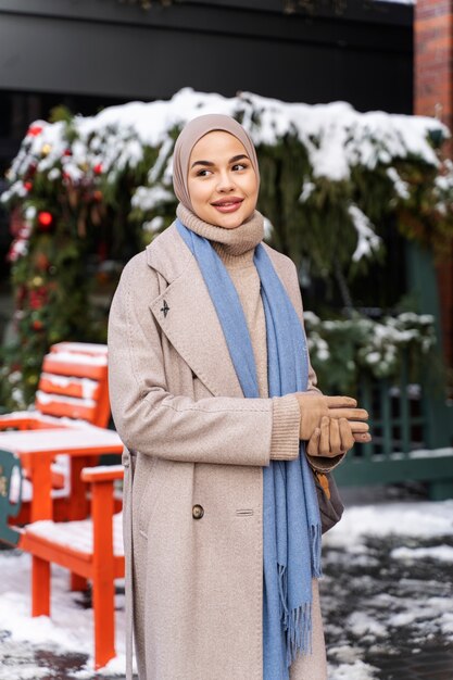 Portrait of muslim woman exploring the city