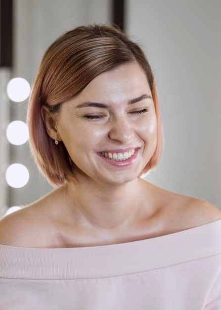 Free photo portrait of natural model laughing