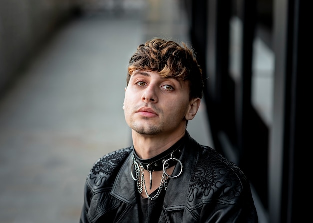 Free photo portrait of non binary person in leather jacket