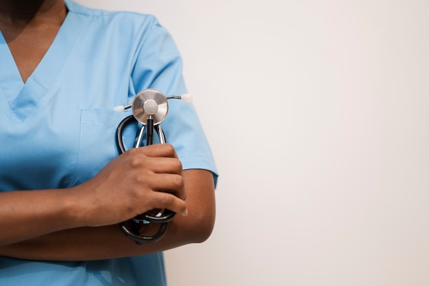 Portrait of nurse in scrubs at the clinic