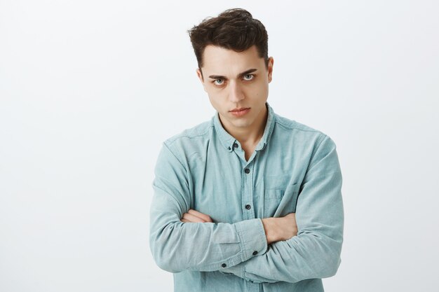 Portrait of offended pissed off european man in shirt