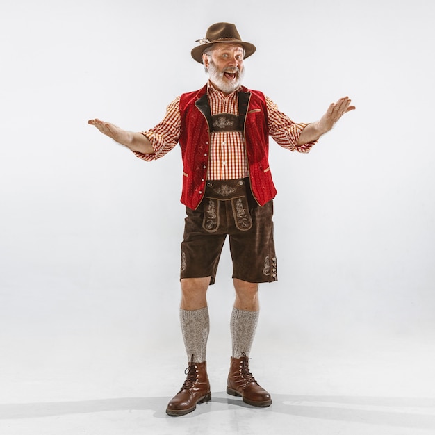 Portrait of Oktoberfest man, wearing the traditional Bavarian clothes