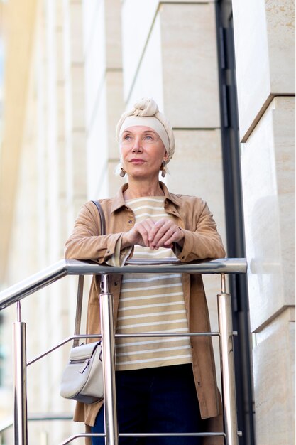 Portrait of older woman outdoors in the city