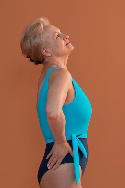 Portrait of older woman in swimsuit