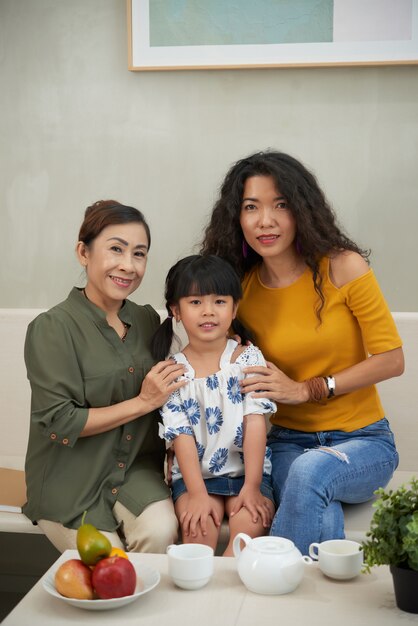 Portrait of other, daughter and grandmother at home