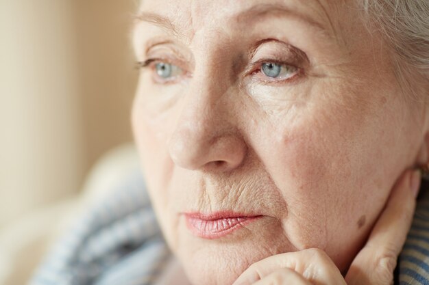 Portrait of pensive old woman