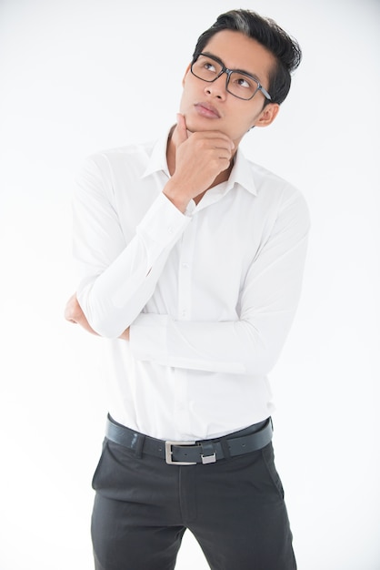 Portrait of pensive young businessman or student