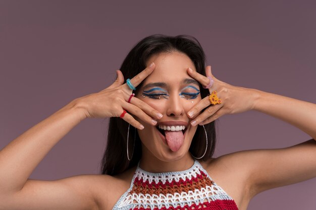 Portrait of person wearing graphic eye makeup