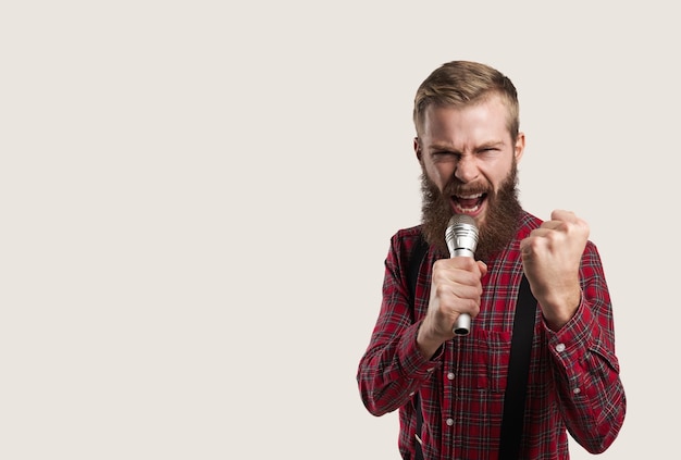 Portrait of person with microphone