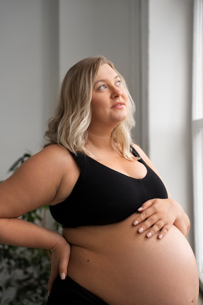 Portrait of plus size pregnant woman