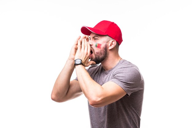 Portrait of Portugal football fan scream support Portugal national team on white background. Football fans concept.