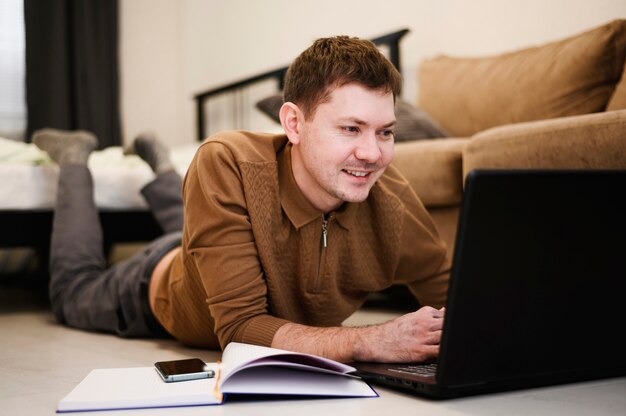 Portrait of positive male working from home