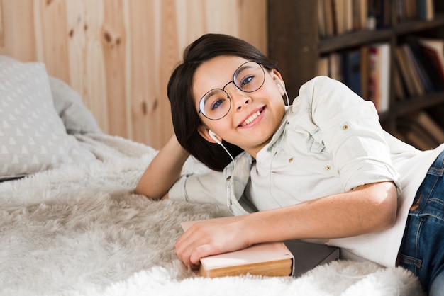 Portrait of positive young girl smiling