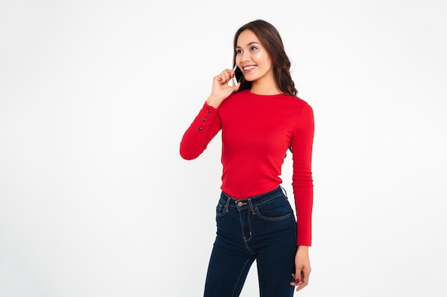 Portrait of a pretty happy asian woman talking