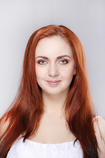 Portrait of pretty redhead woman