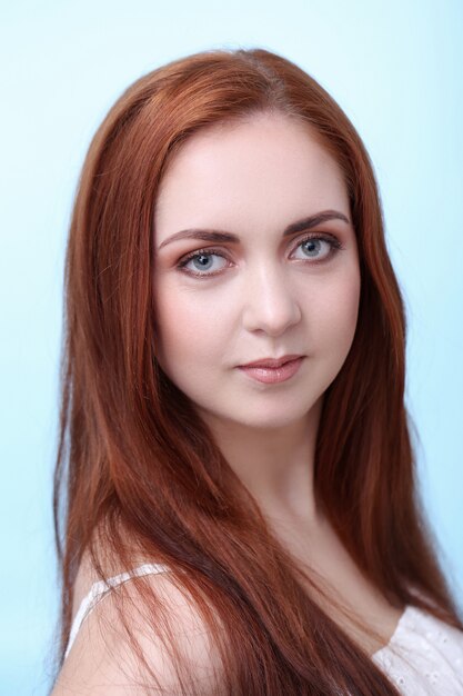 Portrait of pretty redhead woman