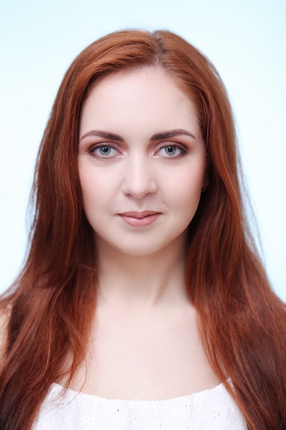 Portrait of pretty redhead woman