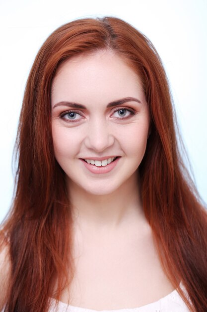 Portrait of pretty redhead woman