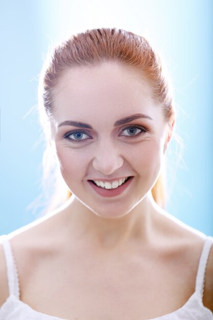 Portrait of pretty redhead woman