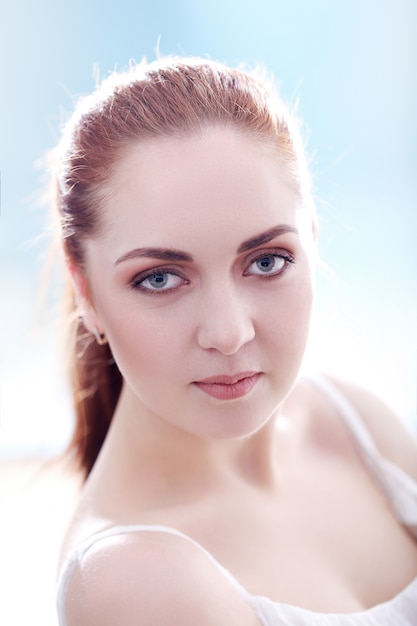 Portrait of pretty redhead woman