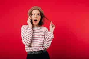 Free photo portrait of a pretty woman wearing beret talking