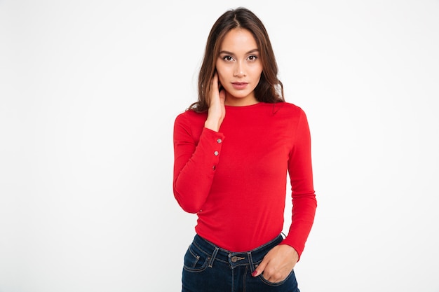 Portrait of a pretty young asian woman posing