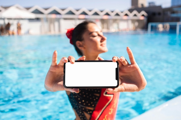 Portrait of pretty young girl posing in swim wear