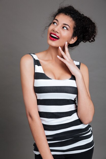 Portrait of a pretty young woman wondering about something