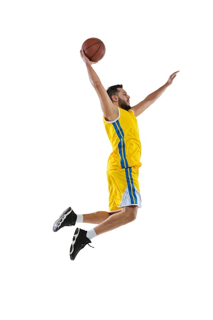 Free photo portrait of professional basketball player training isolated on white studio background