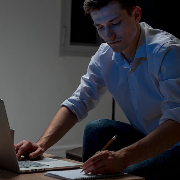 Portrait of professional working from home at night