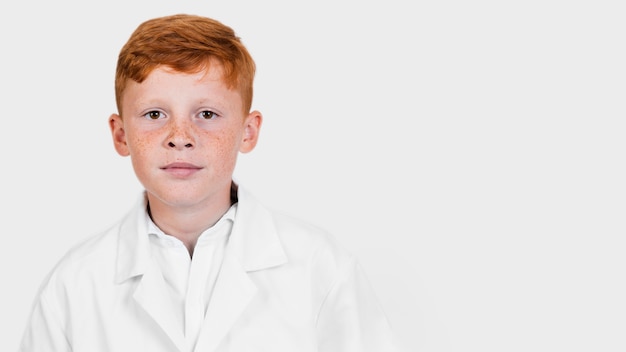 Free photo portrait of red hair kid posing