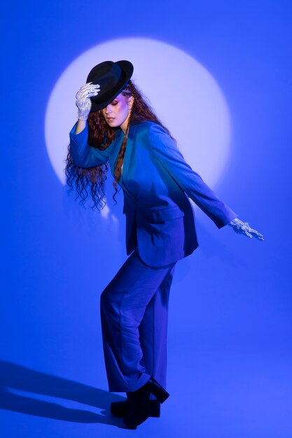 portrait of redhaired woman with hat and white glove
