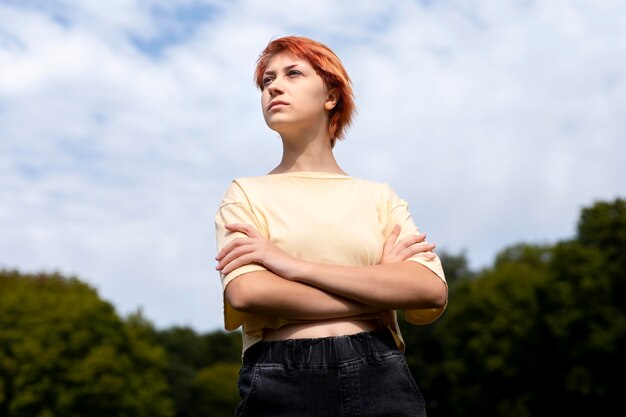 Portrait of redhead girl outdoors