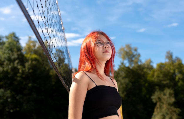 Portrait of redhead girl outdoors