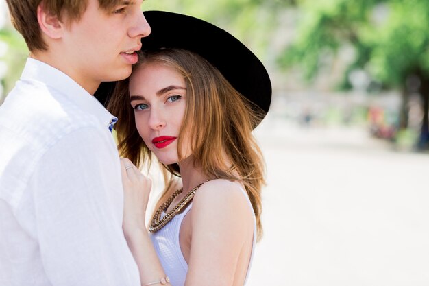 Portrait of romantic couple in summer clothes