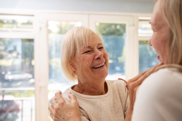 Portrait of romantic elderly lesbian couple