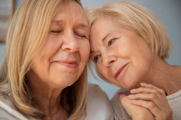 Portrait of romantic elderly lesbian couple