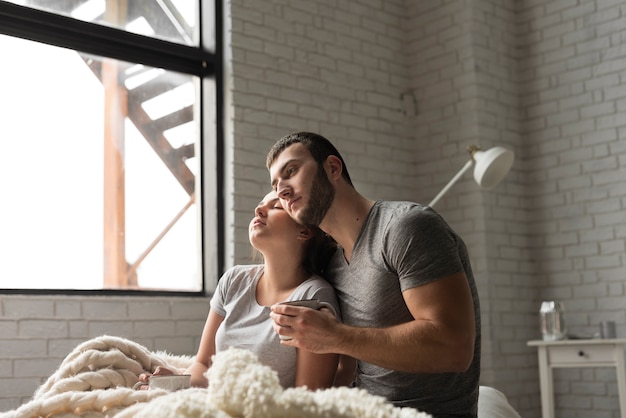 Portrait of romantic young couple together