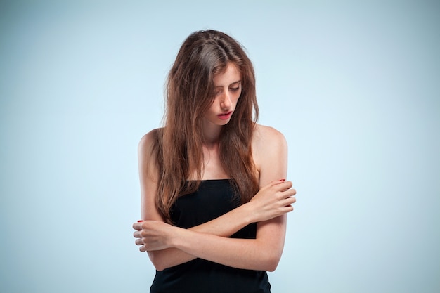 Free photo portrait of sad girl close-up