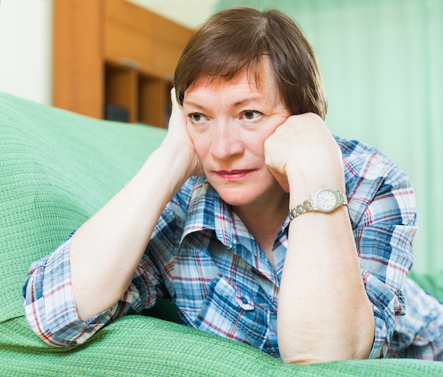 Portrait of sad senior woman