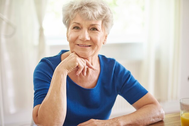 Portrait of senior woman in the sunny day
