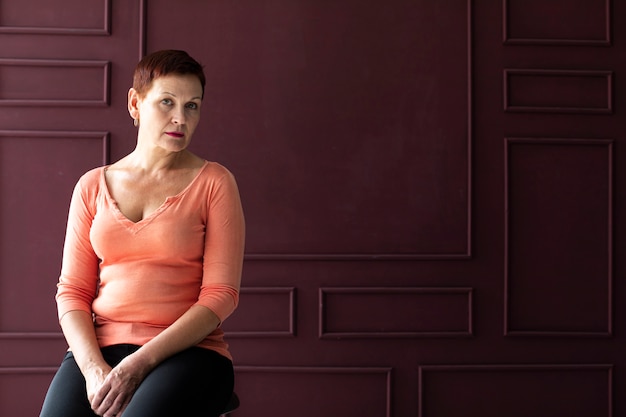 Portrait of senior woman with short hair