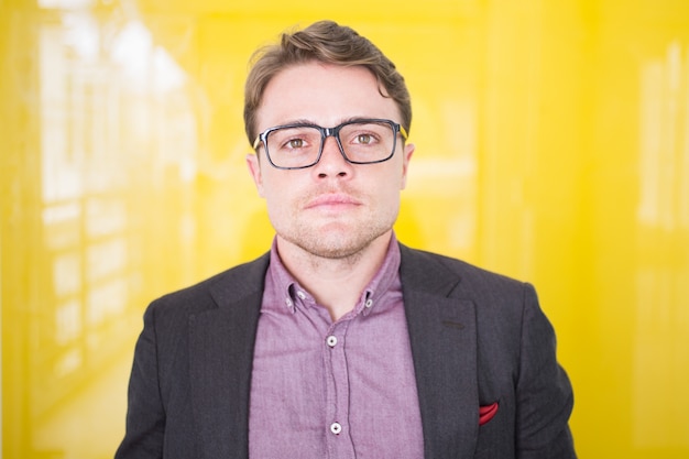 Free Stock Photo: Portrait of Serious Young Businessman in Glasses