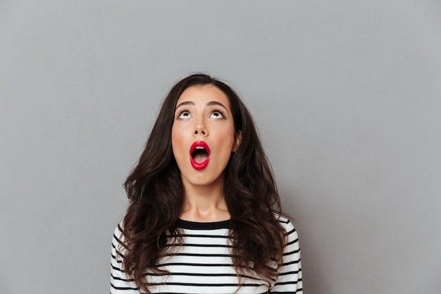 Portrait of a shocked girl looking