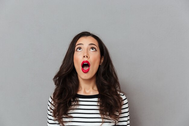 Portrait of a shocked girl looking