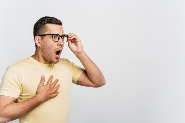 Portrait of a shocked man with copy space