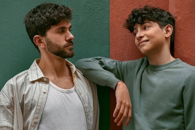 Free photo portrait of siblings outdoors for brothers day celebration