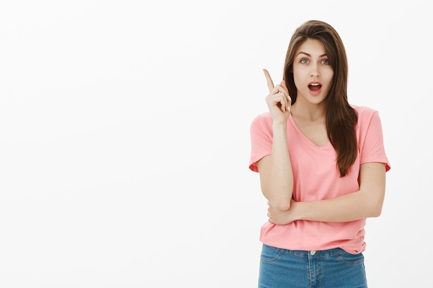 Portrait of smart and attractive brunette woman posing in the studio