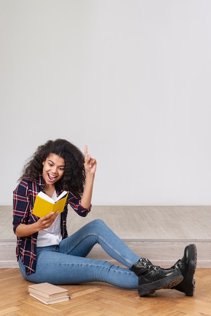 Portrait smiley girl reading