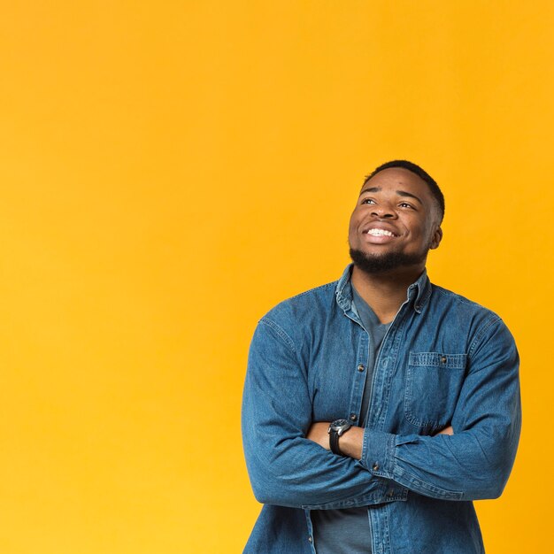 Portrait smiley man with arms crossed